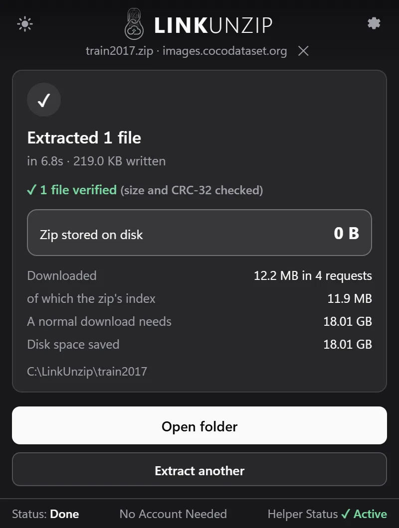 The done screen after taking one photo out of COCO train2017: 1 file verified, zip stored on disk 0 B, 12.2 MB downloaded in 4 requests, of which the zip's index was 11.9 MB.